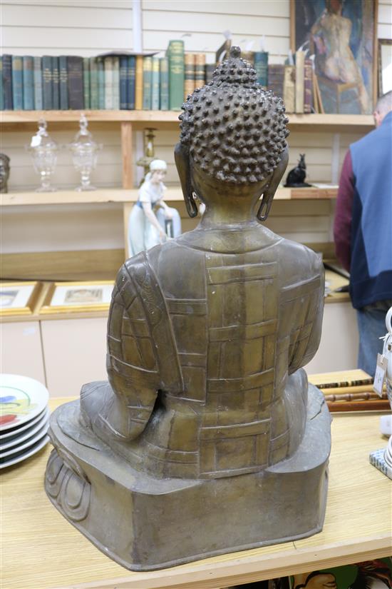 A large bronze seated figure of a Buddha shakyamuni height 69cm